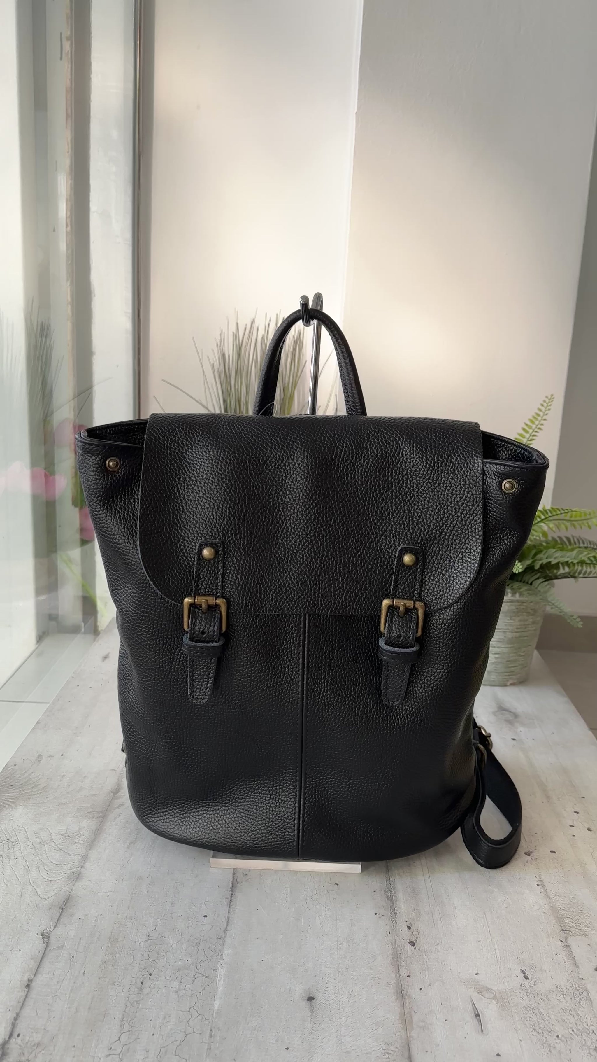 Leather buckle backpack hotsell
